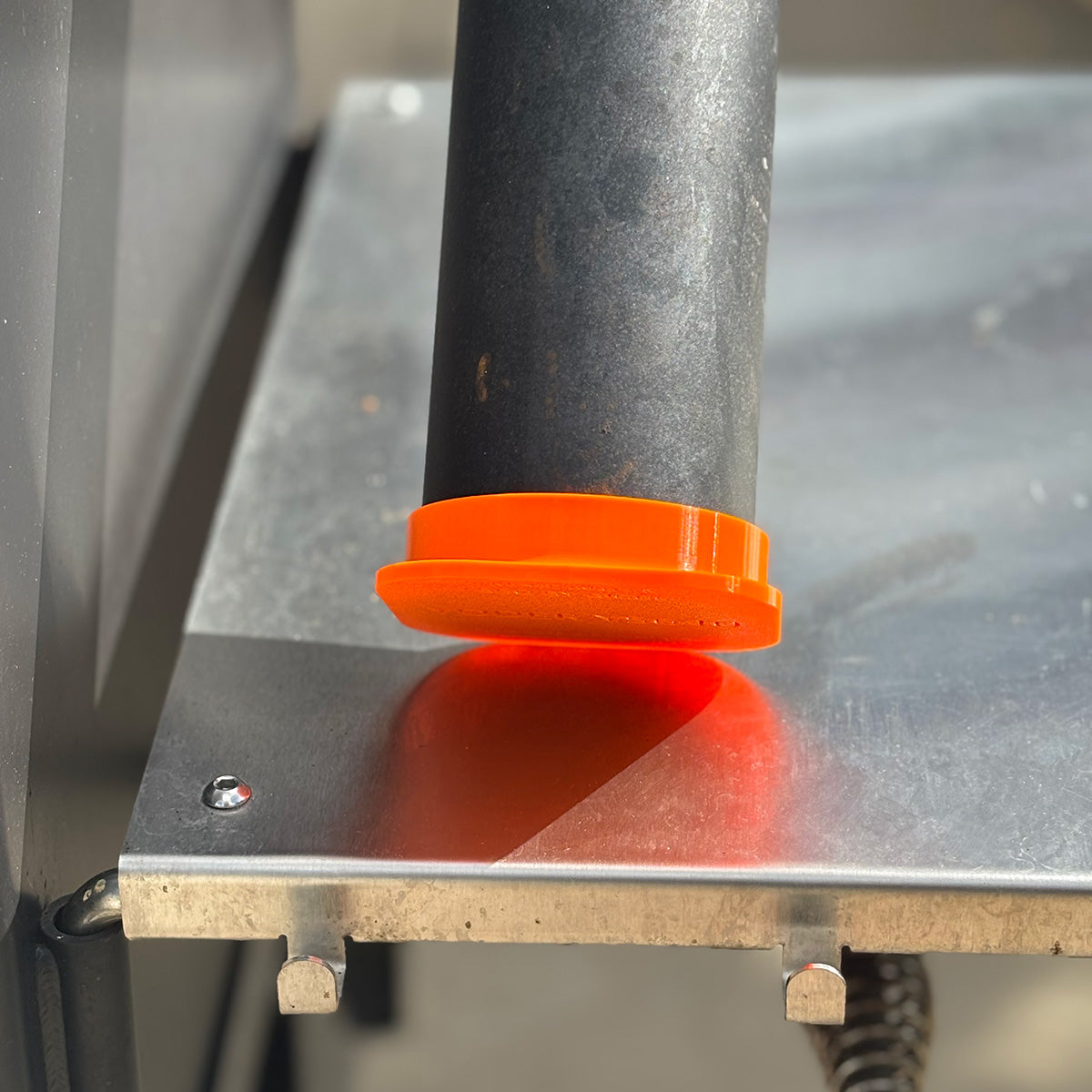 Orange Yoder ys640 smoke stack cap in the down position