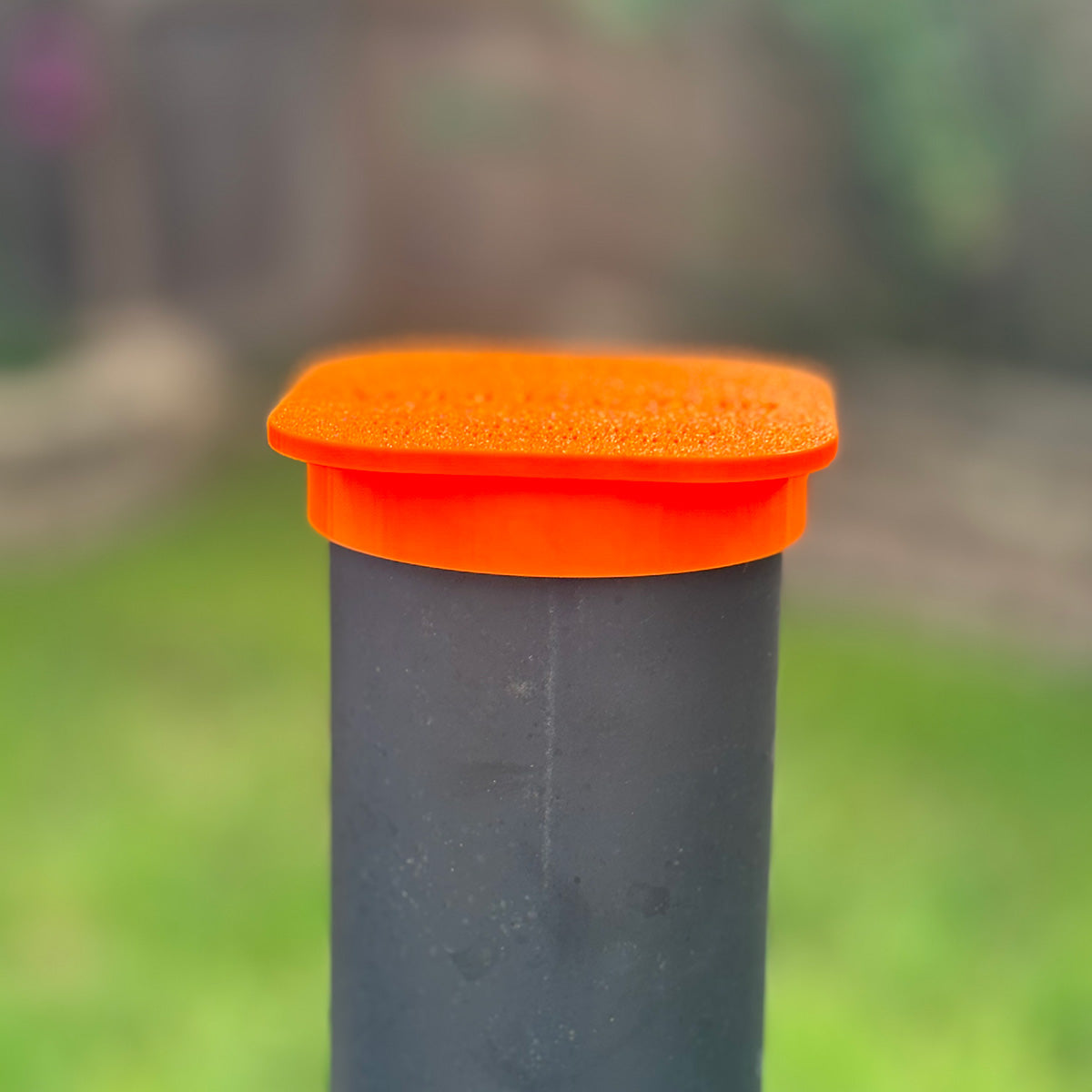 Orange Yoder ys640 smoke stack cap in the upright position